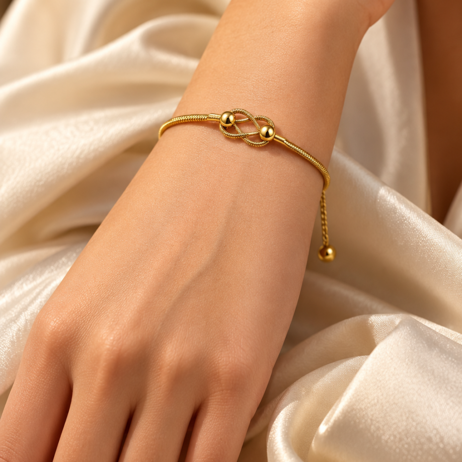 Elegant Infinity Knot Gold Tone Bracelet